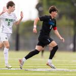 Shorewoods Nikola Genadiev takes the ball up the field during the 3A state semifinal game against Blanchet on Friday, May 29, 2026 in Puyallup, Washington. (Olivia Vanni / The Herald)