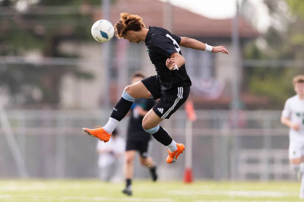 Shorewoods Tajidin Babayev jumps to head the ball during the 3A state semifinal game against Blanchet on Friday, May 29, 2026 in Puyallup, Washington. (Olivia Vanni / The Herald)