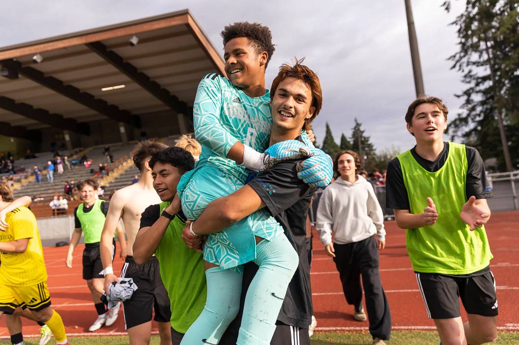 Shorewoods Tajidin Babayev carries Shorewoods Maxwell Smith after beating Bishop Blanchet to advance to the 3A state championship on Friday, May 29, 2026 in Puyallup, Washington. (Olivia Vanni / The Herald)