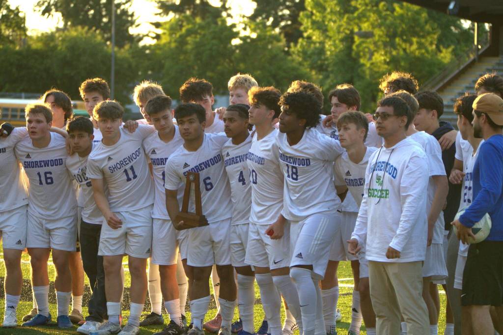 The Shorewood boys soccer team poses with their second-place trophy following the 2026 class 3A boys soccer state championship game against Mercer Island on Saturday, May 30, 2026 at Sparks Stadium in Puyallup. (Qasim Ali / The Herald)