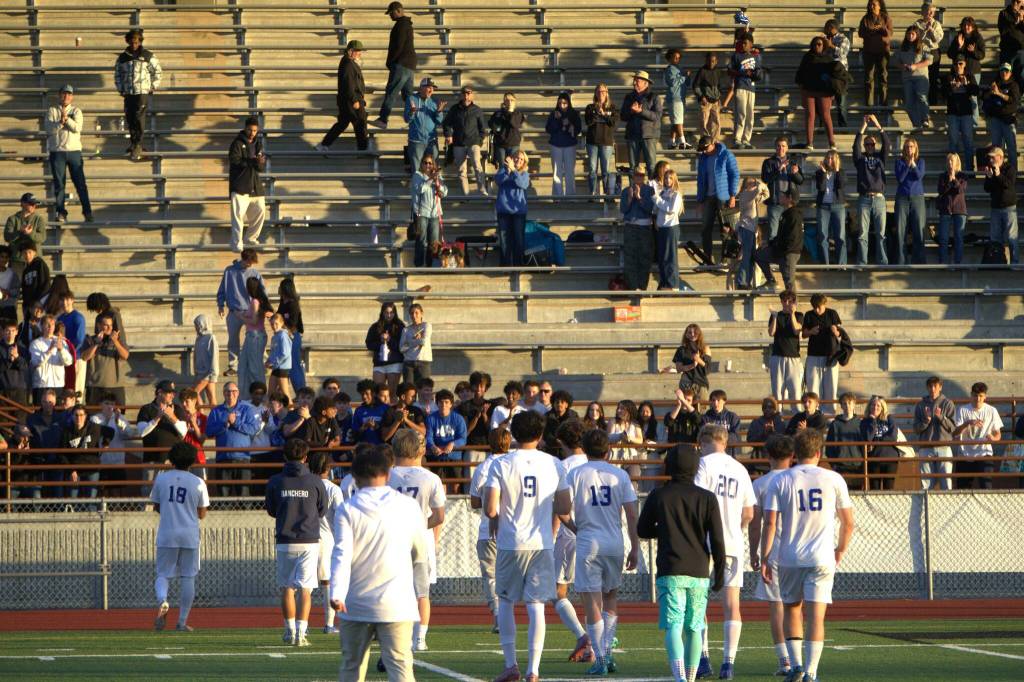 The Shorewood boys soccer team applauds their fans following the 2026 class 3A boys soccer state championship game against Mercer Island on Saturday, May 30, 2026 at Sparks Stadium in Puyallup. (Qasim Ali / The Herald)