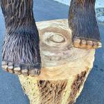 The big feet of a new 12-foot-tall carved Bigfoot nicknamed Cedar Squatchy in front of Squatchys gift shop in Oak Harbor near Deception Pass State Park. (Andrea Brown / The Herald)