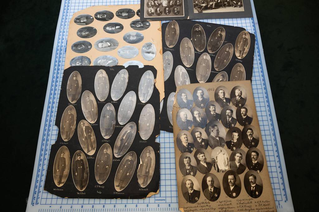 Archival photos of Everett police officers in the early 20th century.
