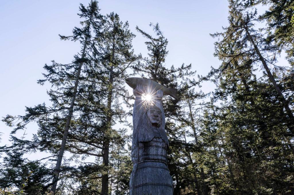 The sun shines through The Maiden of Deception Pass carving facing Rosario Beach at Deception Pass State Park on Monday, March 2, 2026 in Anacortes, Washington. (Olivia Vanni / The Herald)