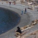 People walk along Rosario Beach on Monday, March 2, 2026 in Anacortes, Washington. (Olivia Vanni / The Herald)