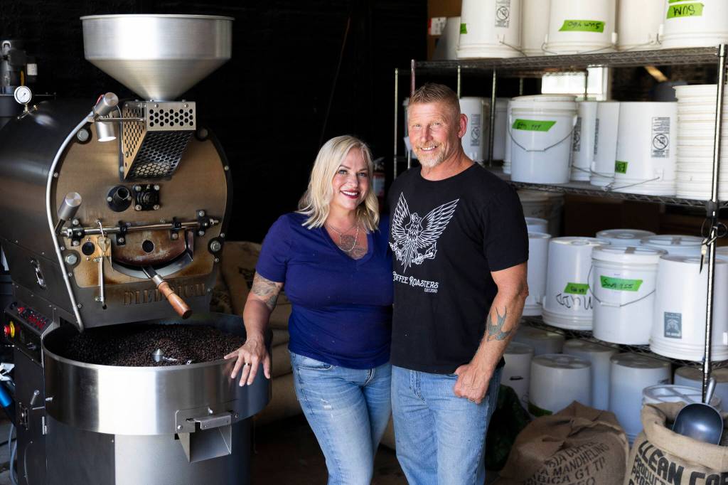 Jaymie and Jeff Rousey, owners of Rousey Coffee Roasters, inside their roastery on Thursday, May 28, 2026 in Gold Bar, Washington. (Olivia Vanni / The Herald)