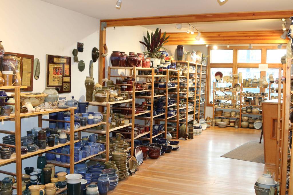 Pieces of pottery line the shelves at the showroom at Bruning Pottery at 115 Avenue D in Snohomish.