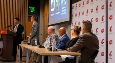 Building Bridges Project founders Jared Mead and Nate Nehring introduce the Building Bridges Summit discussion panel, which includes state and local politicians, on Wednesday, May 27, 2026 at Washington State University Everett. (Provided photo)