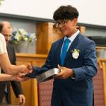 William Gonzalez accepts his diploma during the Everett Christian School graduation on Wednesday, June 3, 2026, in Everett, Washington. (Will Geschke / The Herald)