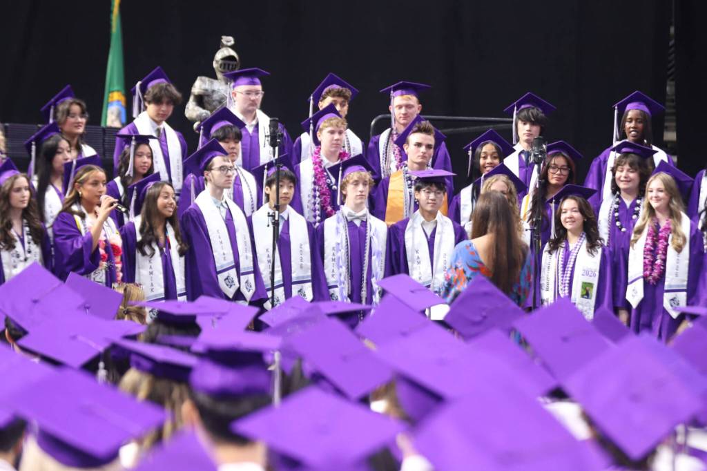 Senior choir members from Kamiak High School perform during the Kamiak High School commencement at the Angel of the Winds Arena on Friday, June 12, 2026, in Everett, Washington. (Michael Hennneke / The Herald)