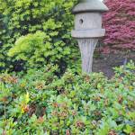 Statuary birdhouse in the yard. (Trevor Cameron)