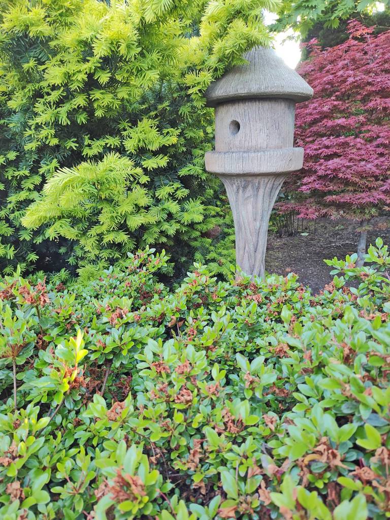 Statuary birdhouse in the yard. (Trevor Cameron)