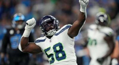 The Seattle Seahawks and edge defender Derick Hall agree to a three-year extension on Tuesday. (Getty Images / The Athletic)