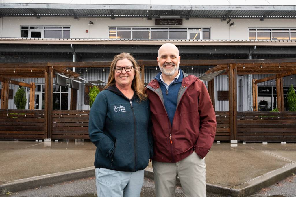 Will Geschke / The Herald
Ardi Kveven, left, and Josh Searle, stand outside of the Ocean Research College Academys building at the Port of Everett.