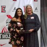Former EvCC track & field star Emily Bland poses with fellow Hall of Famer Sue Grigsby following her induction among the Class of 2026 during the ceremony at the Walt Price Student Fitness Center on June 2, 2026. (Joe Pohoryles / The Herald)