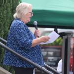 Kim Gorney, executive director of Washington Kids in Transition, speaks during a launch for Edmonds Serves on Saturday in Edmonds. (Michael Henneke / The Herald)