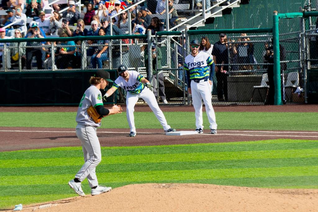 Cal Raleigh of the Seattle Mariners signals to the Everett AquaSox dugout after a base hit during his rehab assignment on Sunday, June 7, 2026 at Everett Memorial Stadium in Everett, Washington. (Photo courtesy of Mason Coe)