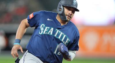 Josh Naylor (12) of the Seattle Mariners scores on a Randy Arozarena single in the eighth inning during the baseball game against the Baltimore Orioles at Camden Yards on June 8, 2026, in Baltimore, Maryland. (Mitchell Layton / Getty Images / Tribune News Services)