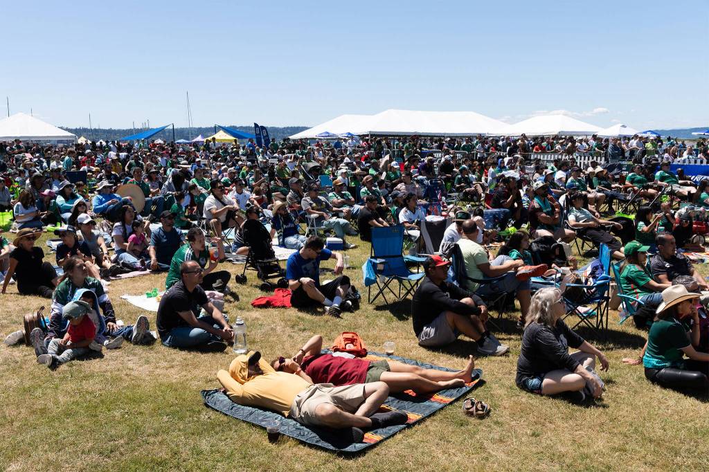 Hundreds of fans watch the opening game of the 2026 FIFA World Cup, between Mexico and South Africa, on Thursday, June 11 at Boxcar Park in Everett, Washington. (Will Geschke / The Herald)