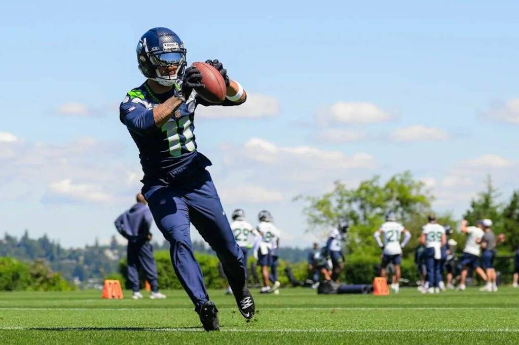 Seahawks receiver Jaxon Smith-Njigba (11) catches the ball during a drill at the Seahawks final minicamp practice on Thursday at the Virginia Mason Athletic Center in Renton. (Photo courtesy Rod Mar / Seattle Seahawks)