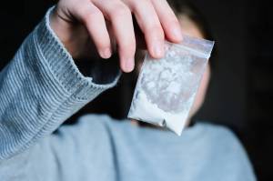 Snohomish County passed an ordinance that makes it a crime for individuals to expose children and dependents to drugs classified as Schedule I, II, III, IV or V, with the exception of marijuana. (Adobe Stock)