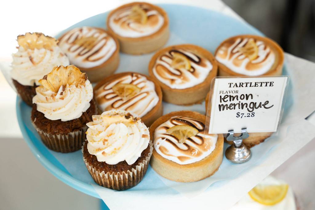 Lemon meringue tarts sit on display at Choux Choux Bakery on Thursday, June 18, 2026, in Everett, Washington. (Will Geschke / The Herald)