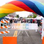 Visitors walk into the Everett Pride block party early in the afternoon on Saturday, June 20, 2026, in Everett, Washington. (Will Geschke / The Herald)