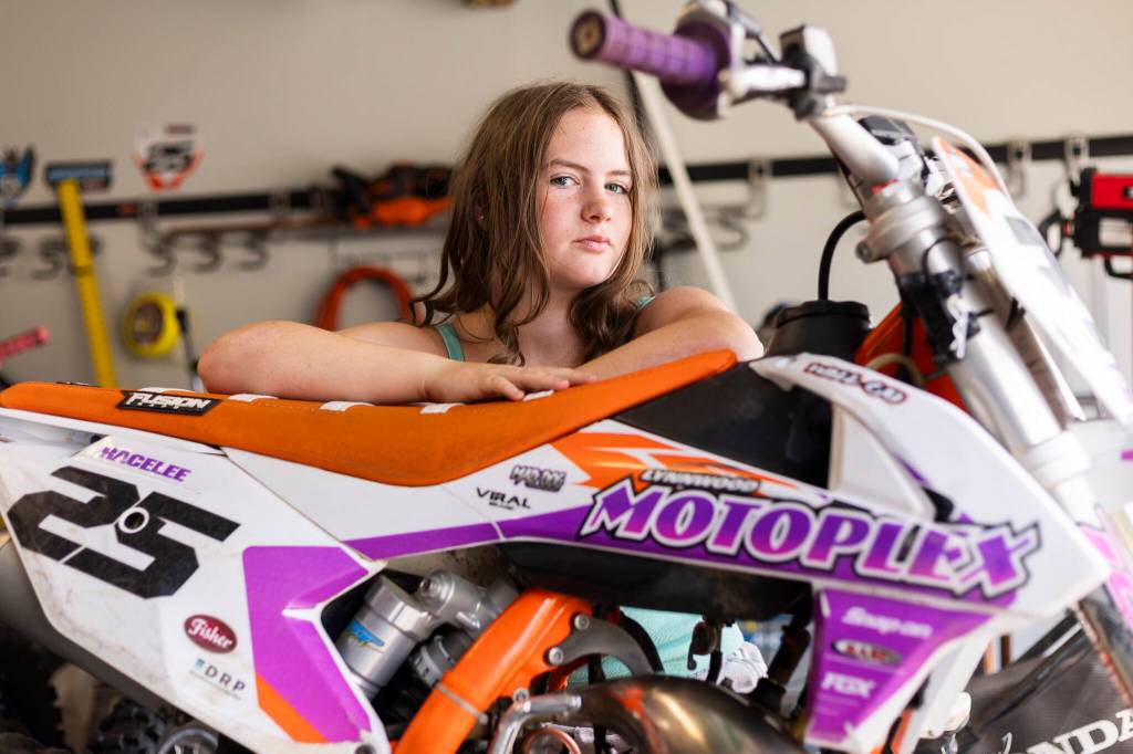 Racelee McCoy, 14, with her bike at her home on Tuesday, June 23, 2026 in Mountlake Terrace, Washington. (Olivia Vanni / The Herald)