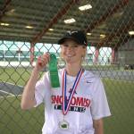 Snohomishs Mak Dauer poses with her medal and ribbon after winning the District 1 3A singles title on May 13 at Skagit Valley College in Mount Vernon. (Qasim Ali / The Herald)