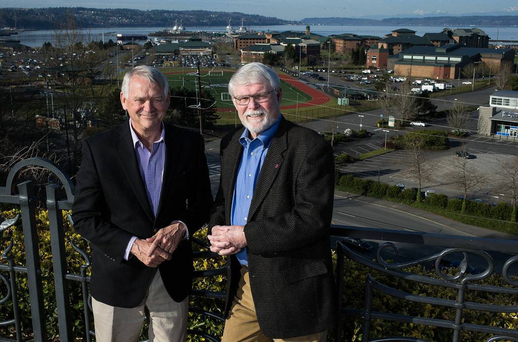 Paul Roberts, left, and Pat McClain on Monday, April 1, 2019 in Everett, Wash. The two helped the City of Everett convince the Navy to build a base, now known as Naval Station Everett. (Andy Bronson / The Herald)