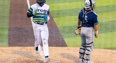 Felnin Celesten #5 of the Everett AquaSox scores during the game against the Hillsboro Hops on Wednesday, May 6, 2026 in Everett, Washington. (Olivia Vanni / The Herald)