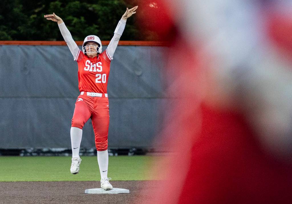 Stanwoods Addi Anderson poses on second base after getting a hit during the game against Monroe on Thursday, May 1, 2025 in Monroe, Washington. (Olivia Vanni / The Herald)