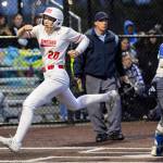 Stanwoods Addi Anderson yells as she crosses home plate to score the go-ahead run during the 3A District 1 championship game against Sedro-Woolley on Thursday, May 15, 2025 in Everett, Washington. (Olivia Vanni / The Herald)