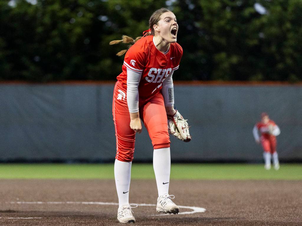 Stanwoods Addi Anderson yells after getting the final out in the game to beat Monroe on Thursday, May 1, 2025 in Monroe, Washington. (Olivia Vanni / The Herald)