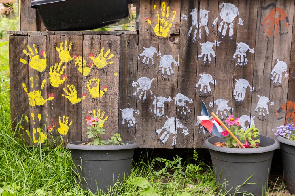 Handprints cover a plant stand at Vaughns Teaching Farm and Kitchen on Thursday, June 25, 2026 in Lynnwood, Washington. (Olivia Vanni / The Herald)