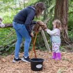Mae Silva, 2, plays with the horse toys with her nanny, Shelby Husby, at Vaughns Teaching Farm and Kitchen on Thursday, June 25, 2026 in Lynnwood, Washington. (Olivia Vanni / The Herald)