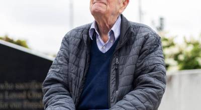 Otis Lull, 102, a veteran of World War II, Korea and Vietnam sits at Veterans Park on Tuesday, June 30, 2026 in Lynnwood, Washington. (Olivia Vanni / The Herald)