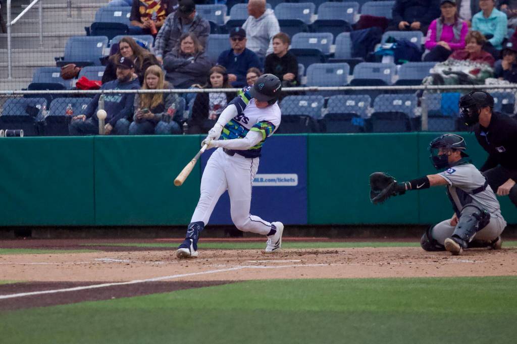 AquaSox outfielder Jonny Farmelo hits a home run during Everetts 3-2 win against Tri-City at Everett Memorial Stadium on June 30, 2026. (Joe Pohoryles / The Herald)