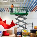 Construction workers install wiring in the new cafeteria at Jackson Elementary School on Tuesday, July 7, 2026, in Everett, Washington. (Olivia Vanni / The Herald)