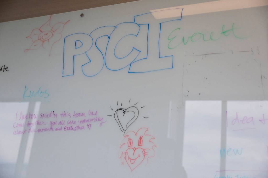 A whiteboard with positive messages is visible in the hallway of the new infusion center at Providence Regional Medical Center Everett on Thursday, July 2, 2026, in Everett, Washington. (Olivia Vanni / The Herald)