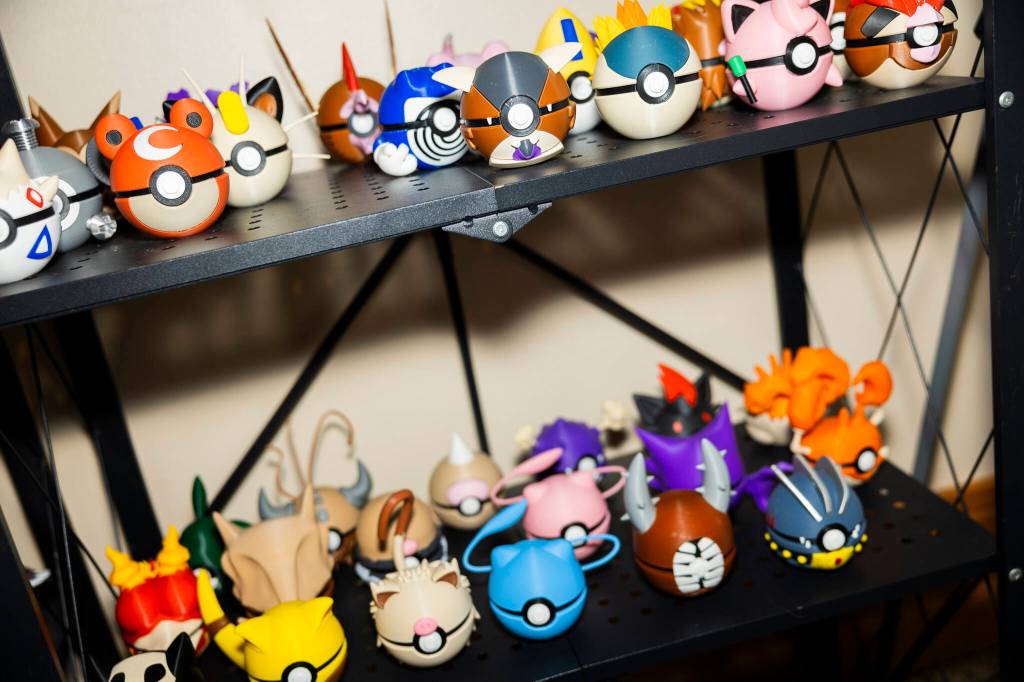 A selection of 3D printed Pokemon themed poke balls available at GeekFest West on Friday, July 17, 2026, in Lynnwood, Washington. (Olivia Vanni / The Herald)