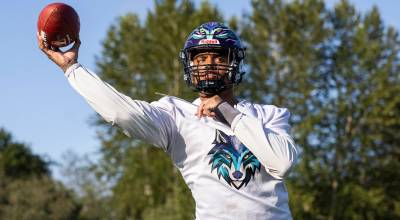 Washington Wolfpack quarterback Jaiave Magalei throws during practice on Friday, July 24, 2026 in Everett, Washington. (Olivia Vanni / The Herald)