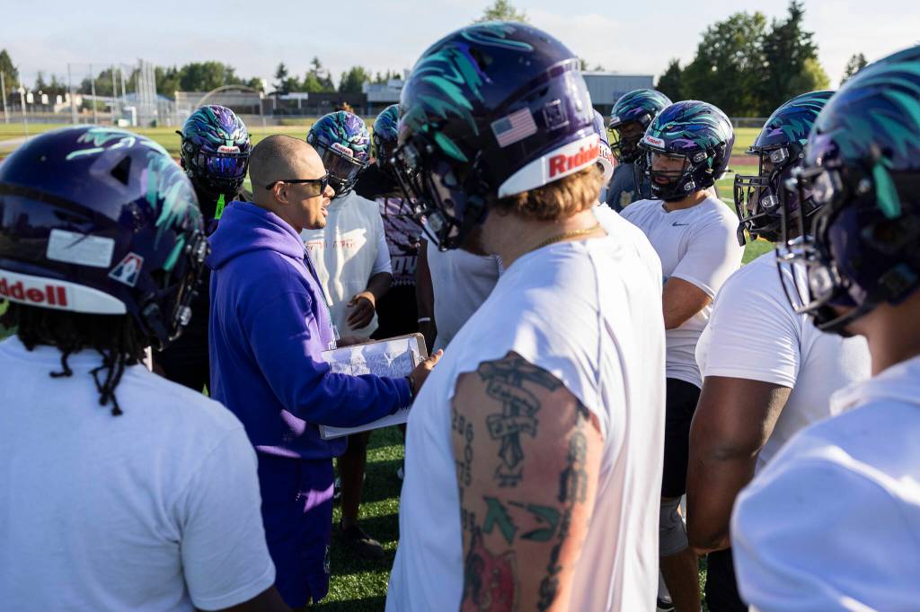 Washington Wolfpack head coach JR Wells talks to his team during practice on Friday, July 24, 2026 in Everett, Washington. (Olivia Vanni / The Herald)