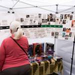 Attendees browse a history display during the 33rd annual Nubian Jam on Saturday, July 25, 2026, in Everett, Washington. (Will Geschke / The Herald)