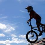 A cyclist drops in to the pump track at Jensen Park on Wednesday, July 29, 2026, in Arlington, Washington. (Olivia Vanni / The Herald)