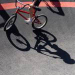 A cyclist maneuvers around a bend in the Jensen Park pump track on Wednesday, July 29, 2026m in Arlington, Washington. (Olivia Vanni / The Herald)