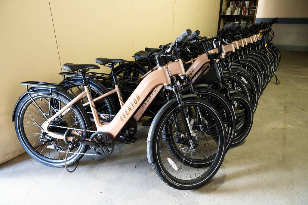 Rental e-bikes that will be available under the library program, seen here on Tuesday in Everett. (Will Geschke / The Herald)