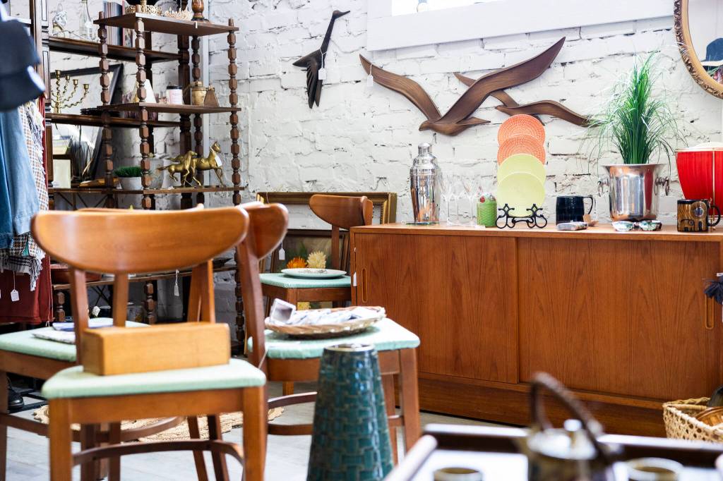A vendor area with a selection of mid-century modern pieces at the Grand Leader Mercantile on Wednesday, July 22, 2026 in Everett, Washington. (Olivia Vanni / The Herald)