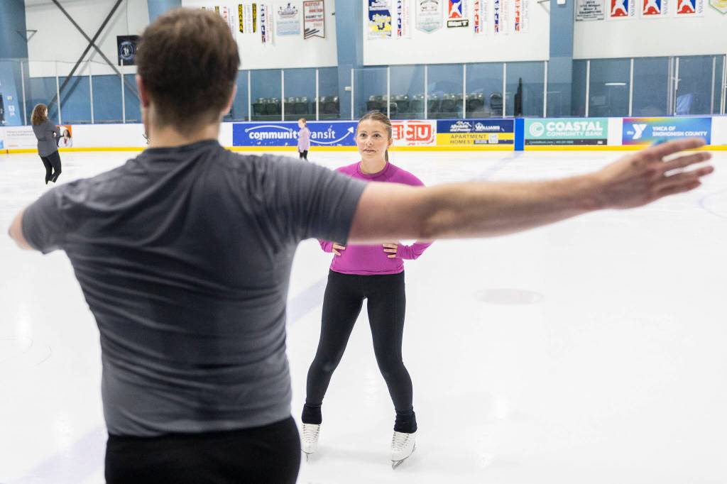 Aspire skater Maya Metin takes instructions during class at Angel of the Winds Arena Community Ice Rink on Wednesday, July 29, 2026 in Everett, Washington. (Olivia Vanni / The Herald)