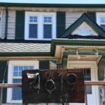 A 100-year-old home on Glenwood Avenue was damaged in a suspected arson after a hedge in the front yard caught fire on July 17, 2026, in Everett, Washington. (Ian Davis-Leonard/The Daily Herald)